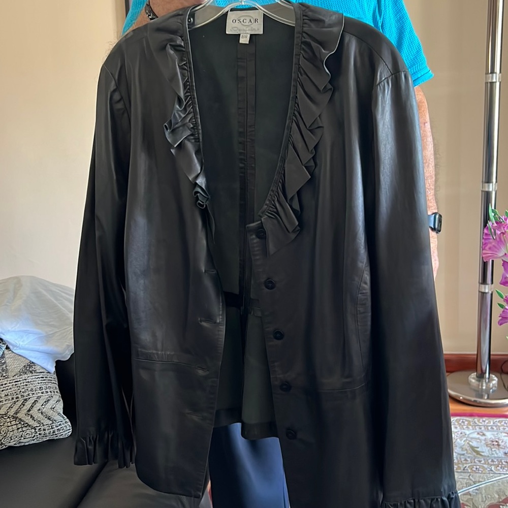 Oscar de la renta thin and light leather jacket. Very chic.